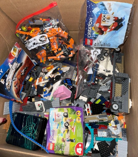 10lbs of Legos- including some New Kits