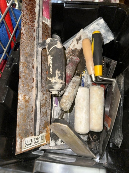 Tub full of Tile work Tools