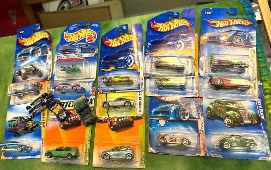 Box of Hotwheels and Matchbox Cars- most are New