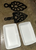 2 Antique Wilton Cast Iron Trivets and Set of 5 American Airlines Dishes