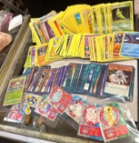 Group of Unsearched Pokemon Cards and Yu-Gi-Oh Cards