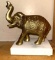 Golden Elephant on An Alabaster Stand