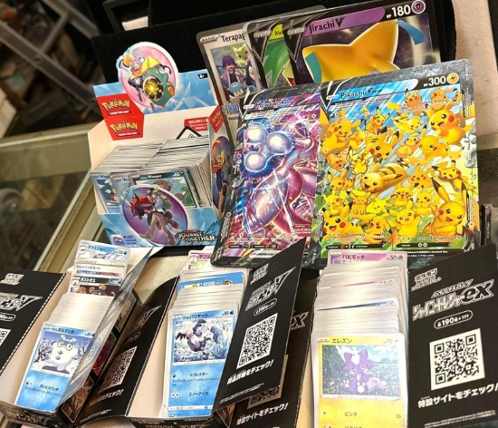 4 Boxes of Unsearched Pokemon cards and 7 Jumbo Cards