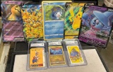 5 Jumbo Pokemon cards and 3 Graded Cards (Pokemon & Mario)