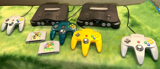 2 Nintendo 64 Consoles, 4 Controllers and 2 Video Games