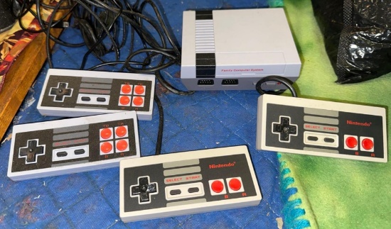 2 Original Nintendo Controllers and Nintendo Style Video game console with 2 controllers