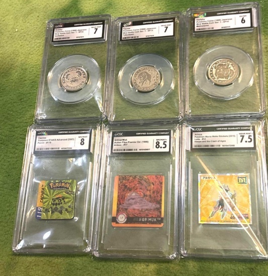 3- 1998 Pokemon Japanese coins and 3 Cards/Stickers- All Slabbed and Graded