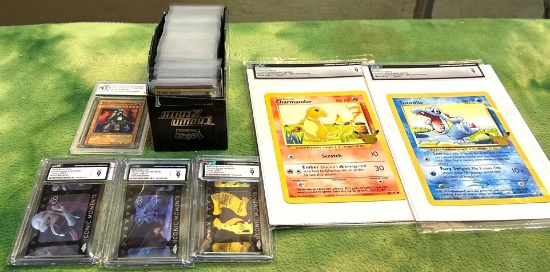 Box of Sleeved Pokemon cards, 2 Jumbo Graded cards, 3 Graded Disney cards & 1 Graded Yu-Gi-Oh card
