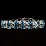14K Gold 22.68ct Blue Topaz 0.80ct Diamond Bracelet