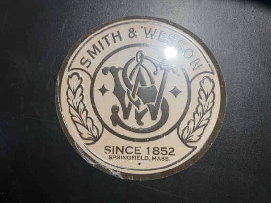 Round Smith & Wesson Sign