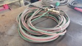 Acetelene and oxygen hoses with torch and