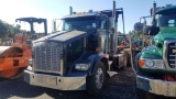 2001 Kenworth T800 Roll off.  C15 cat power, 18