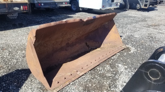 Loader side dump bucket