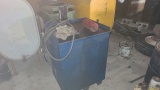 Grease tank with pump
