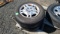 (2) Bridgestone 195/75/14 tires and rims