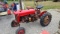 Farmall cub tractor with bar mower