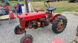 Farmall cub tractor with bar mower