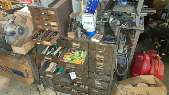 Cabinet with assorted collets and drill bits