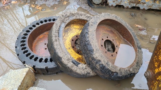 (3) skidsteer demo tires