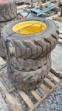 (4) 10-16.5 skidsteer tires and rims