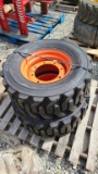 (2) 12-16.5 skidsteer tires and rims