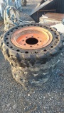 4 solid skidsteer tires