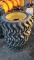 4 new 10 - 16.5 skidsteer tires and rims