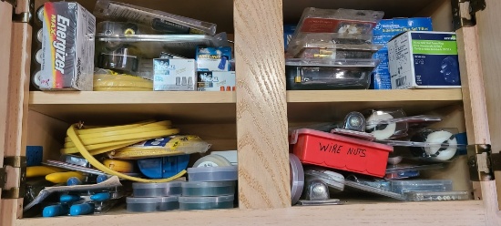 Cabinet contents of batteries, handtools,