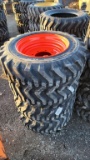 4 new 10 - 16.5 skidsteer tires and rims