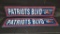 (2) Patriots Blvd Tin Signs