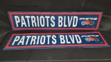 (2) Patriots Blvd Tin Signs