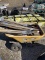 Wheelbarrow with 9 post hole diggers