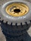 4- skid steer tires with rims