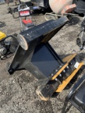 Skid steer post driver attachment