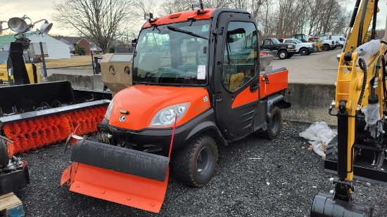 Kubota rtv1100 with sander and plow