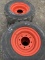 4- skid steer tires with rims 10X16.5