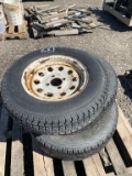 3 tires; 1 trailer tire; 2 LT245/75R16 with rims
