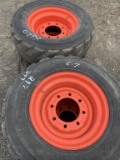 4- skid steer tires with rims 10X16.5
