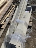 Pallet lot of vinyl fence posts and rails