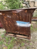 Self dumping dumpster