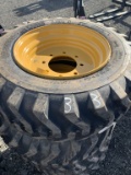 New 4- 10X16.5 skid steer tires with rims