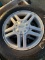 4- tires with Ford rims 195/65R15