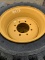 4- new skid steer tires with rims 10-16.5