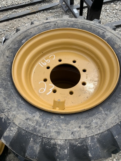 4 new skid steer tires with rims 10X16.5