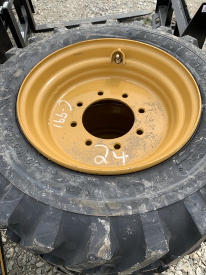 4 new skid steer tires with rims 10X16.5