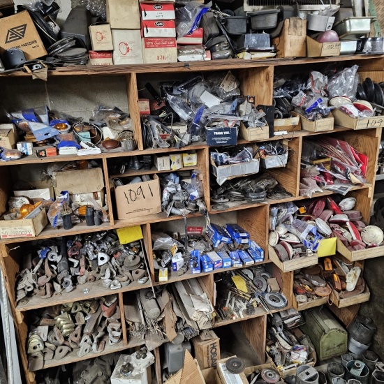 Large wall bin with assorted truck parts, lights