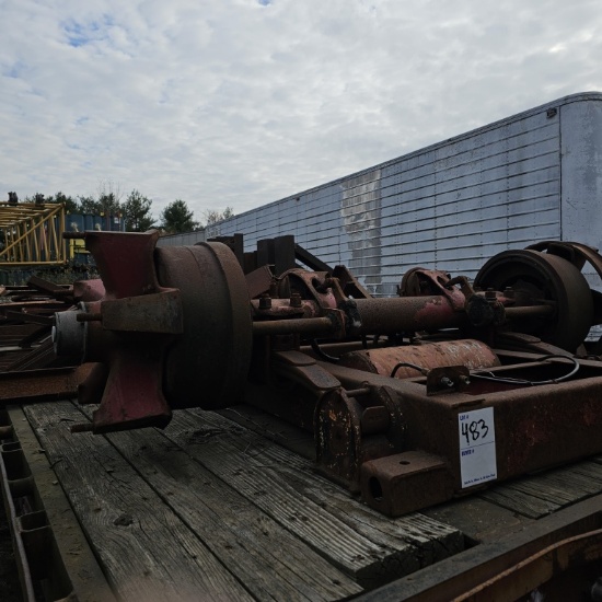 Assorted axles, metal on top of deck