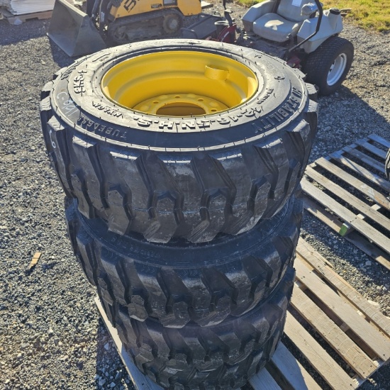 (4) Forerunner12-16.5 skidsteer tires with rims