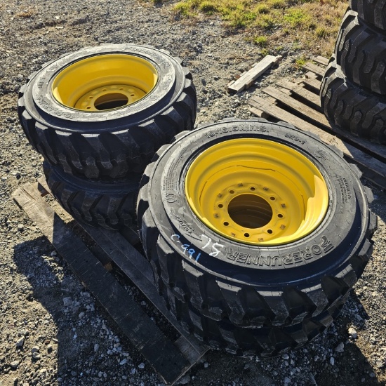 (4) forerunner 10-16.5 skidsteer tires with rims