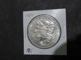 1884 MORGAN DOLLAR (Dent bottom center)